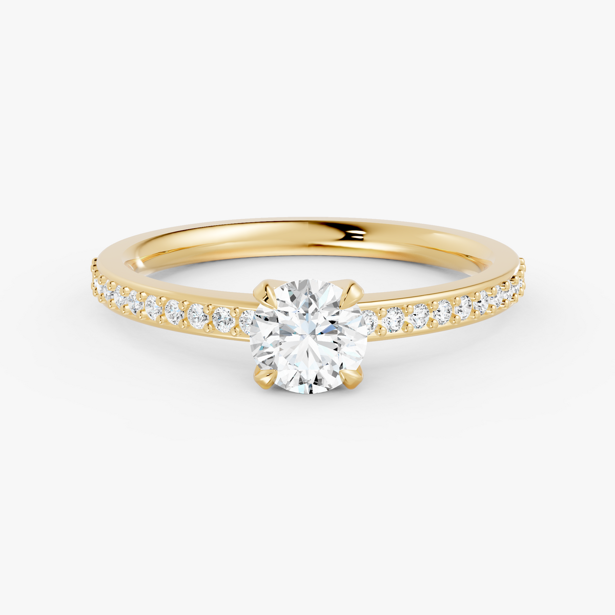 Amélie pavé forlovelsesring med rund diamant i gult gull, liggende sett forfra