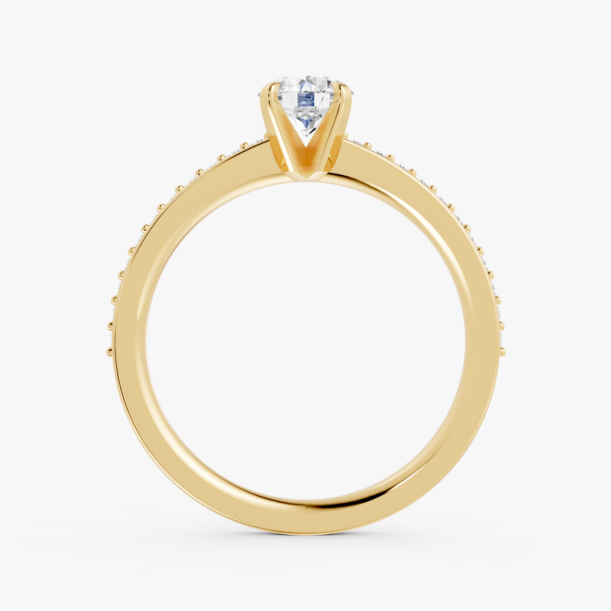 Amélie pavé forlovelsesring med rund diamant i gult gull, stående sett forfra