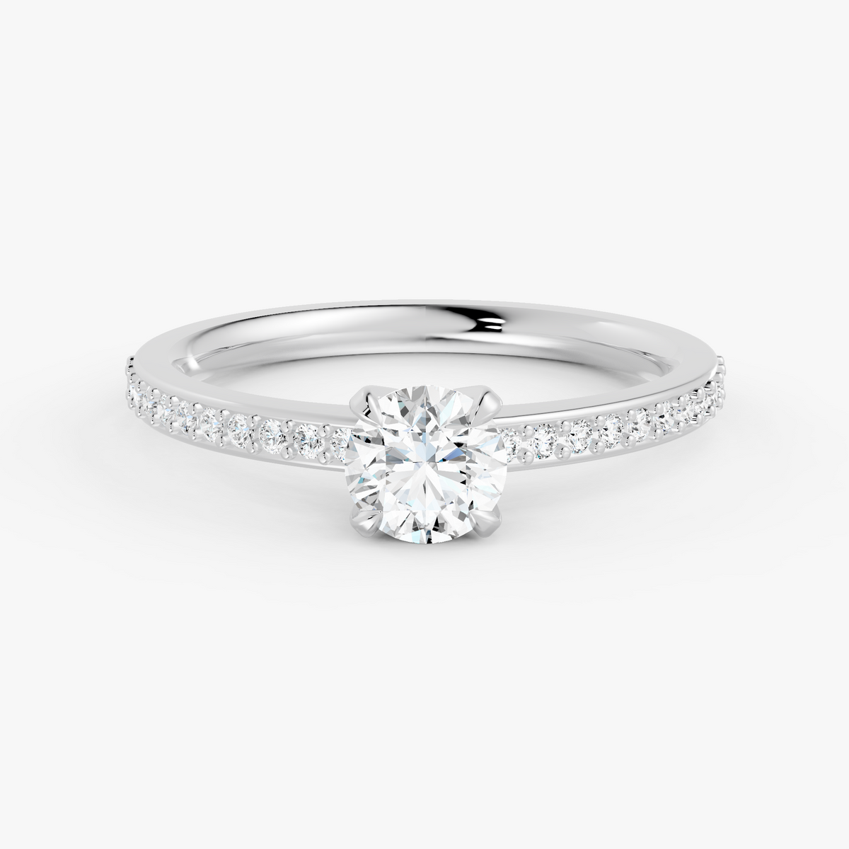 Amélie pavé forlovelsesring med rund diamant i hvitt gull, liggende sett forfra