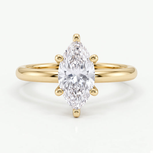 Colette solitaire forlovelsesring med marquise diamant i gult gull