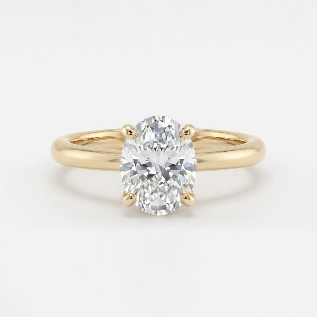 Aurora solitaire forlovelsesring med oval diamant i gult gull