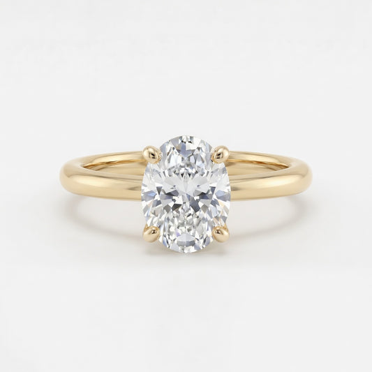Aurora solitaire forlovelsesring med oval diamant i gult gull