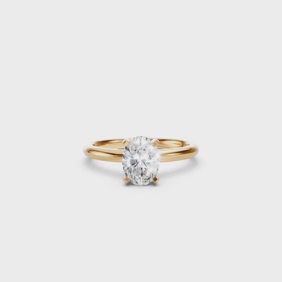 Aurora solitaire forlovelsesring med oval diamant i gult gull