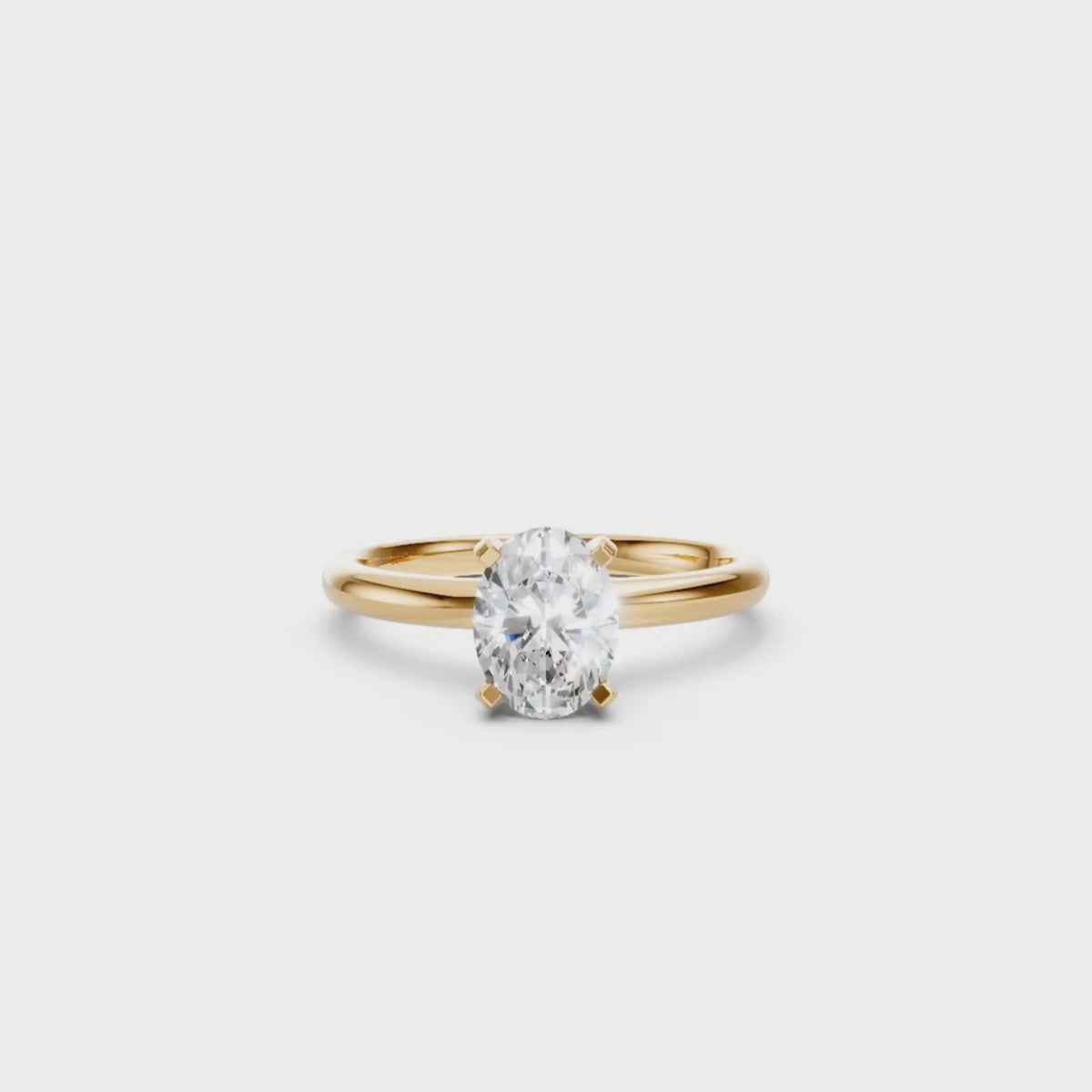 Aurora solitaire forlovelsesring med oval diamant i gult gull