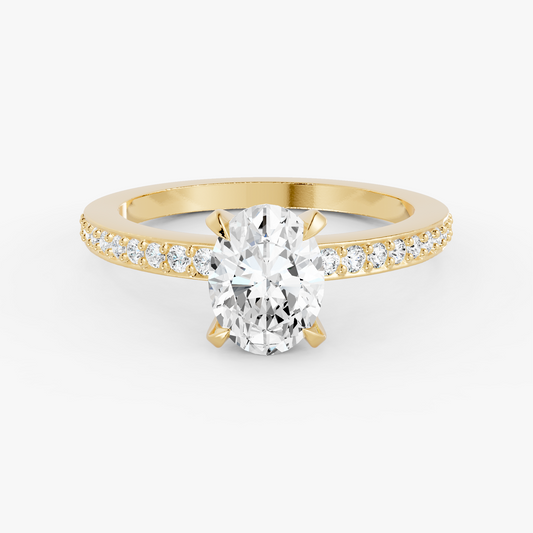 Seraphine pavé forlovelsesring med oval diamant i gult gull, liggende sett forfra